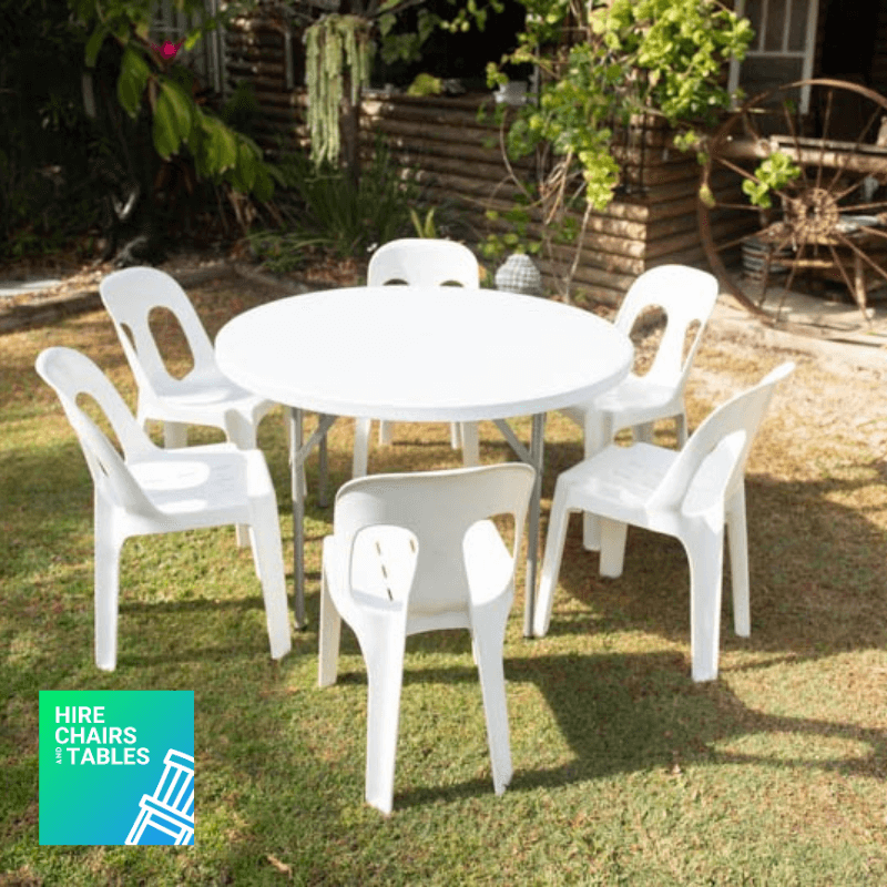 white round table with 6 chairs